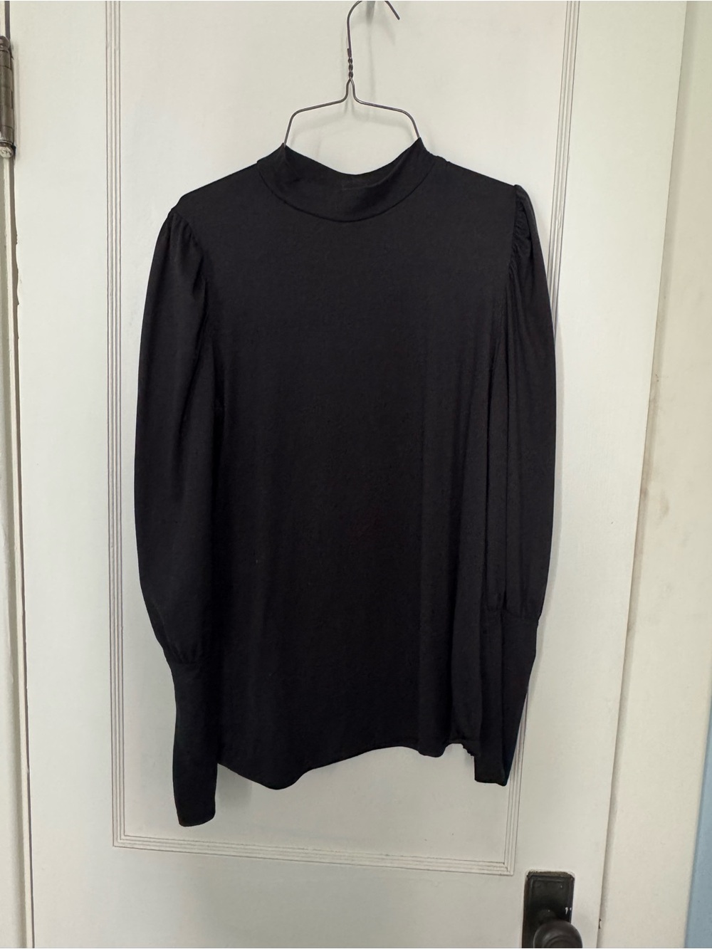 Celeste Black Top with Red Heart Tag